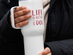 Stainless steel travel mug with quote " life is better with a dog".